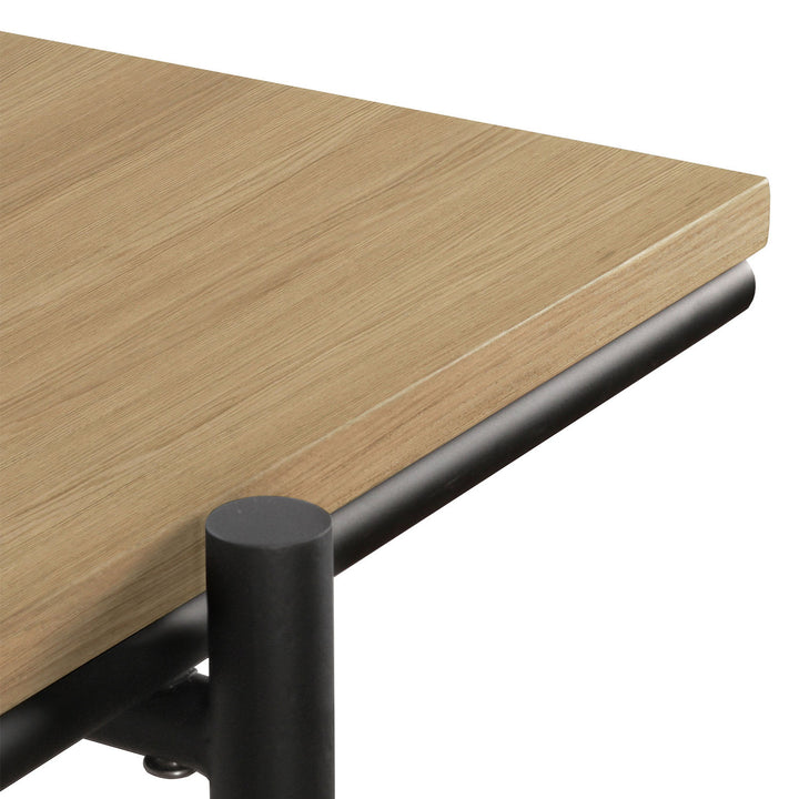 Minimalist light wood tabletop with black metal support leg detail.