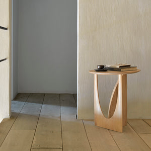 Simplistic modern wooden table with unique 'Y' shaped base design. - hover