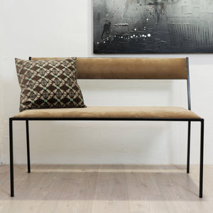 Contemporary steel bench with upholstered tan fabric, minimalist design. - hover