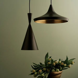 Contemporary pendant light with sleek inverted cone shape and golden hue. - hover