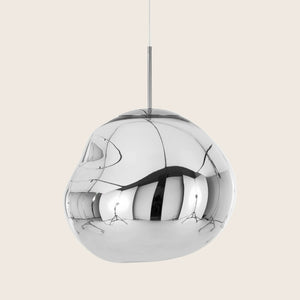 Contemporary pendant light with artistic design showcases swirling silver shades - hover
