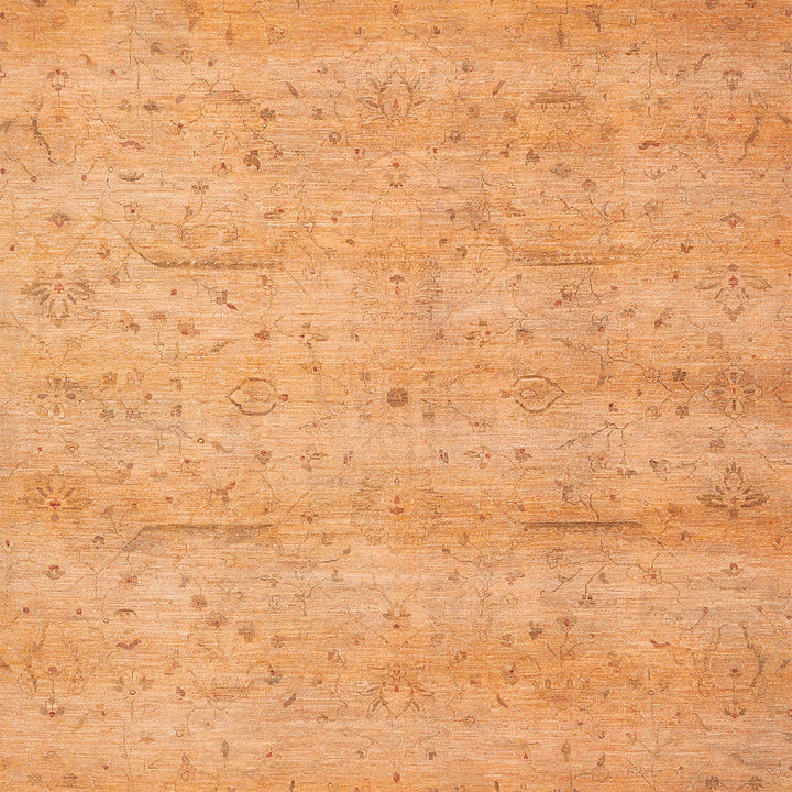 Vintage floral pattern on warm beige textured fabric or wallpaper.