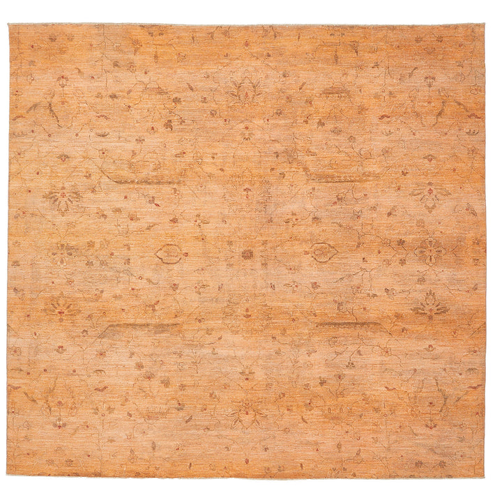 Ornate handcrafted rug with floral motifs in warm color palette