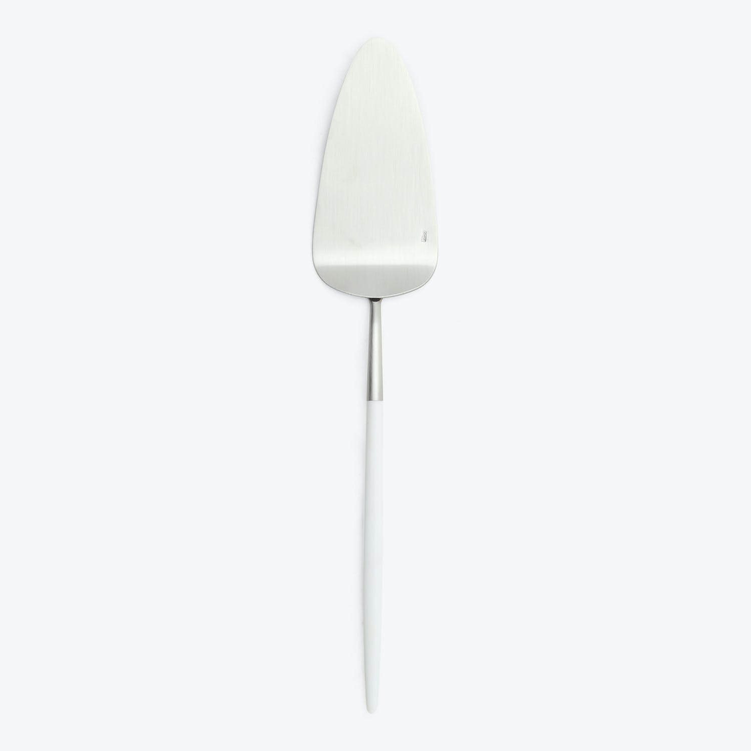 Simple white cake server with triangular blade and long handle.