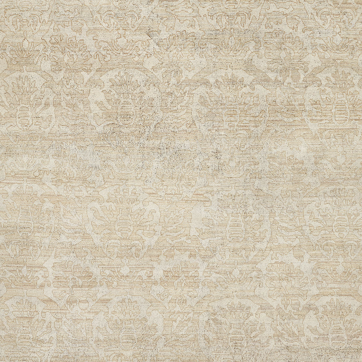 Intricate damask pattern fabric in muted colors for home decor.