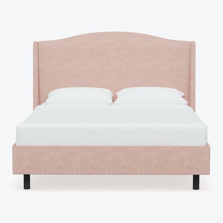 Double/queen size bed with pinkish-beige upholstered headboard, against white background.