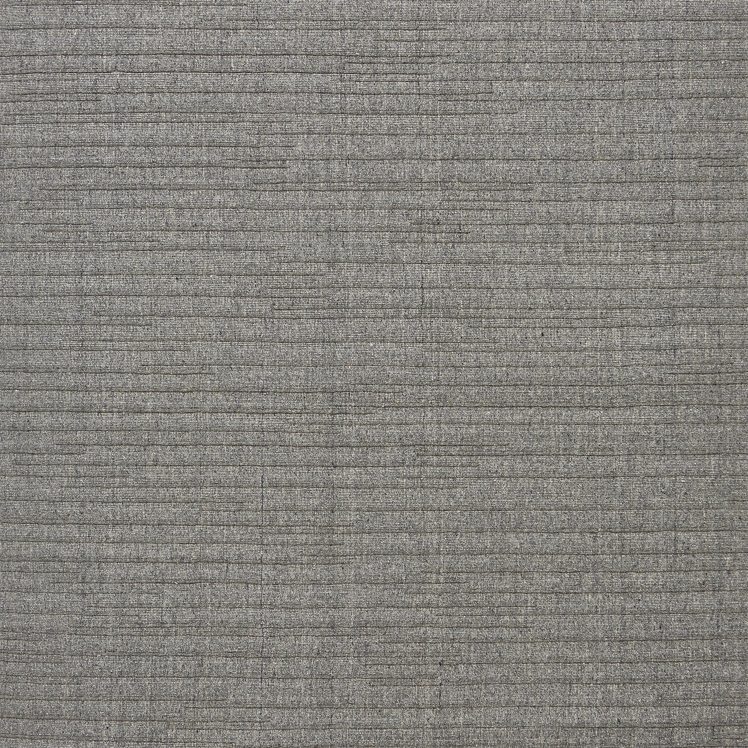 Close-up of gray woven fabric with speckled texture pattern.