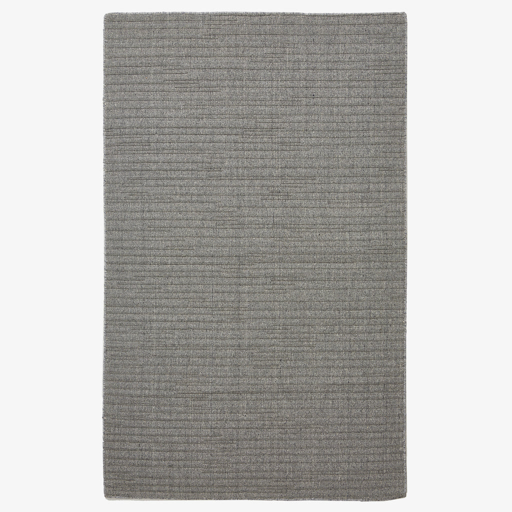 Rectangular gray rug with horizontal lines on white background.