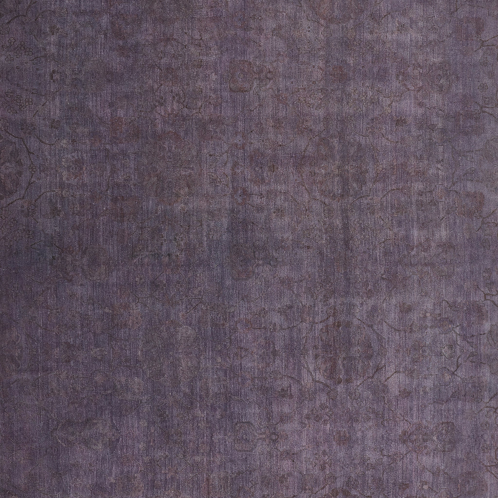 Close-up of textured fabric in faded violet with intricate design