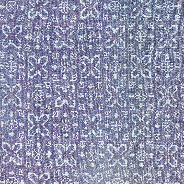 Pastel fabric with geometric shapes and floral motifs, symmetrical pattern.