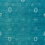 Vintage teal fabric with diamond pattern and floral motifs distressed.