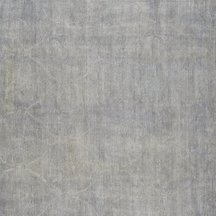 Neutral gray textured surface with subtle, organic pattern variations.