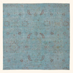 Vintage rectangular area rug with traditional floral design in blue.