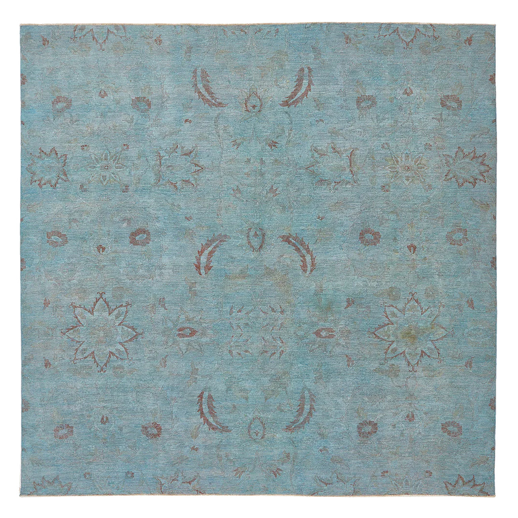 Vintage rectangular area rug with traditional floral design in blue.