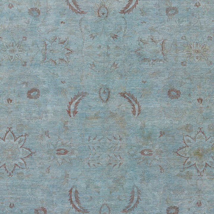 Vintage distressed textile with floral and ornamental symmetrical design.