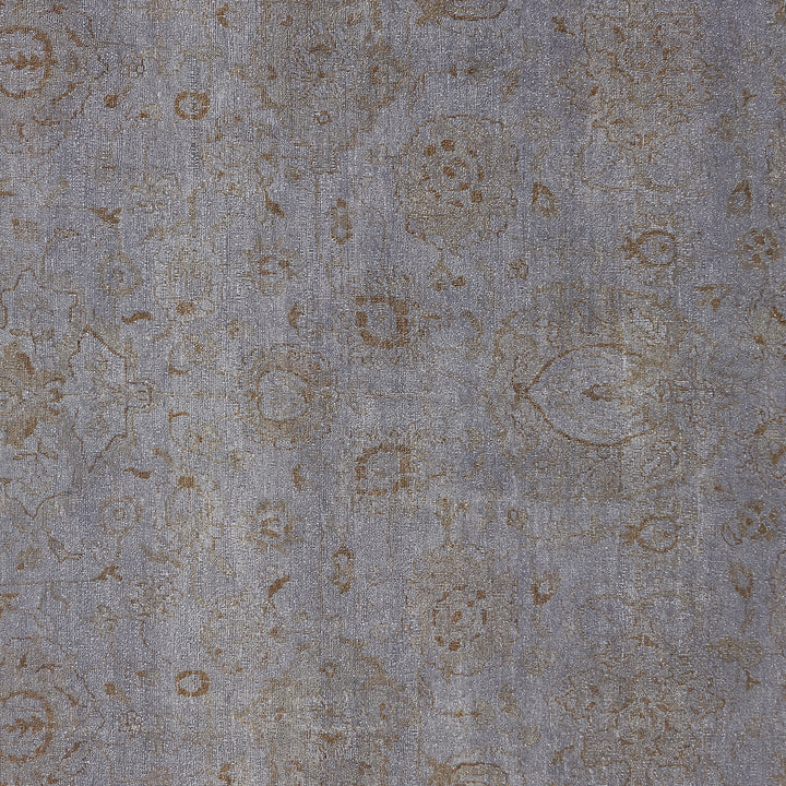 Elegant fabric with ornate design in blues and gold hues.