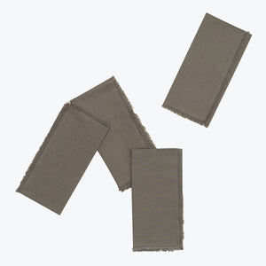 Three cream fabric pieces layered with fringed edges, white background. - hover