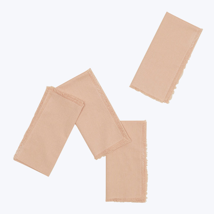 Three beige rectangular fabric pieces with frayed edges on white.