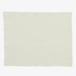 Plain off-white fabric with frayed edges on white background.