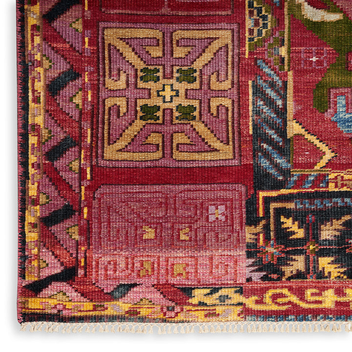 Intricate traditional woven rug with geometric patterns in vibrant colors.