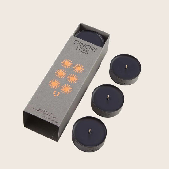 Luxury scented candles in stylish packaging by Ginori 1735.