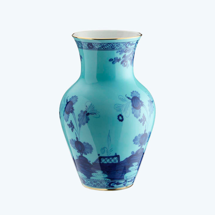 Traditional blue and white Chinese porcelain vase with floral motifs.
