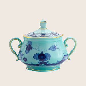 Pink sugar bowl with floral pattern, gold trim and handles. - hover
