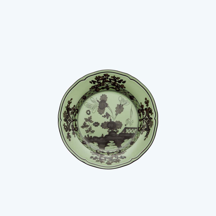 Traditional East Asian celadon plate with black floral pattern design.