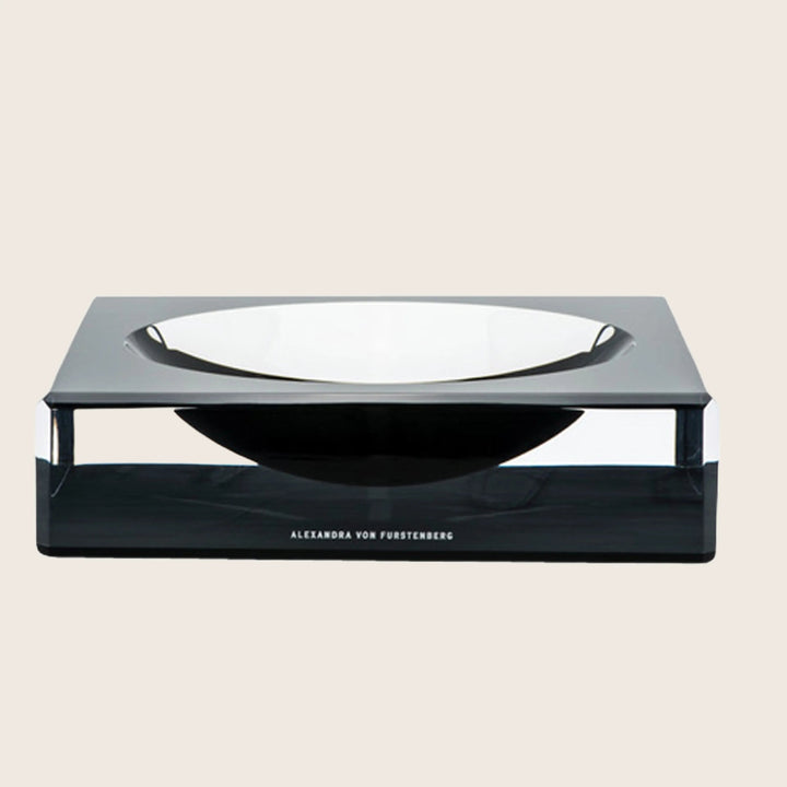 Sleek, modern decor bowl on stand by Alexandra von Furstenberg
