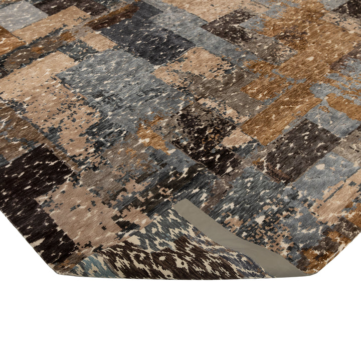 Close-up of contemporary rug with abstract rectangles in brown tones.