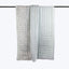 Elegant light gray curtains with subtle textures for home decor.