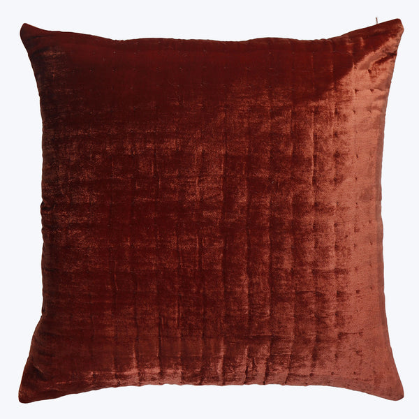 Rich burgundy velvet square pillow with subtle sheen and piping.