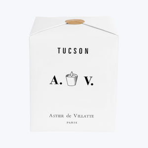 Unlit scented candle in glass container with TUCSON A.V. PARIS label. - hover