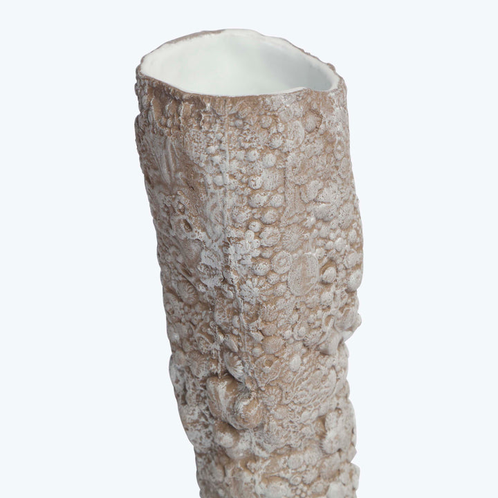 Organic-inspired ceramic vase with textured coral-like surface, earthy tones.