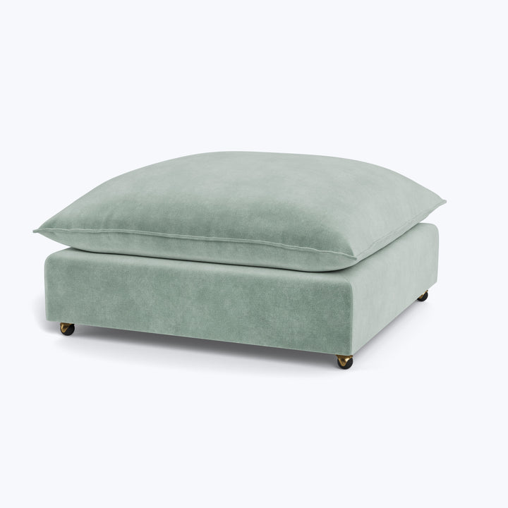 Montauk Ottoman with Casters Graceland, Performance Blend / Sorrell