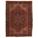 Intricate handwoven Persian rug with rich red and blue colors