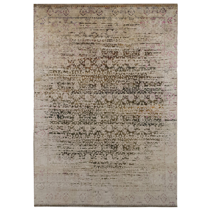 Vintage distressed rug with ornate pattern in neutral tones.