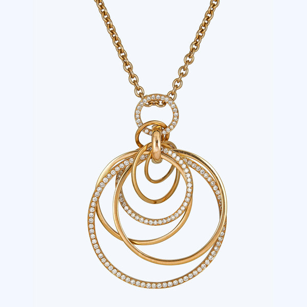 Gold and diamond interlocking rings pendant