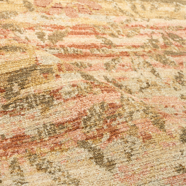 Close-up of vintage rug with complex multicolored pattern and texture