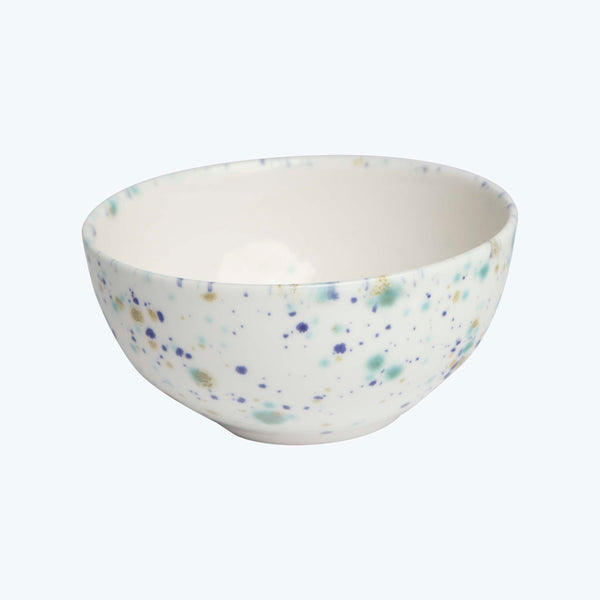 Round ceramic bowl with blue and green speckled pattern design