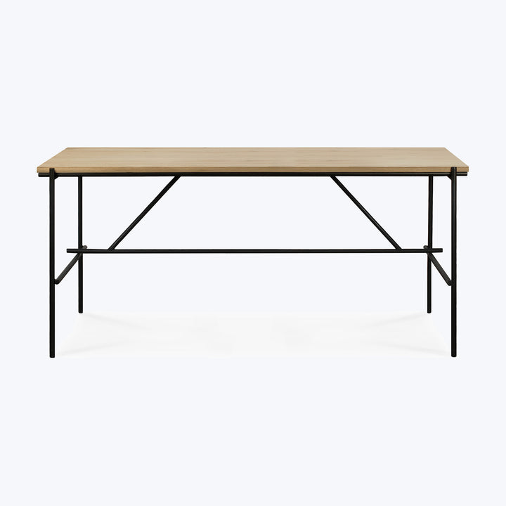 Modern-style table with light wood top and black metal frame.