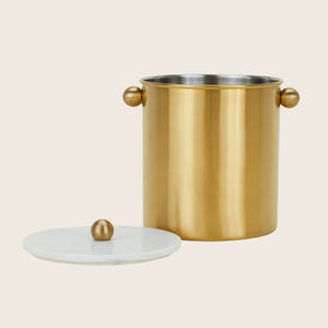 Gold-colored cylindrical container with lid and spherical handles on white - hover