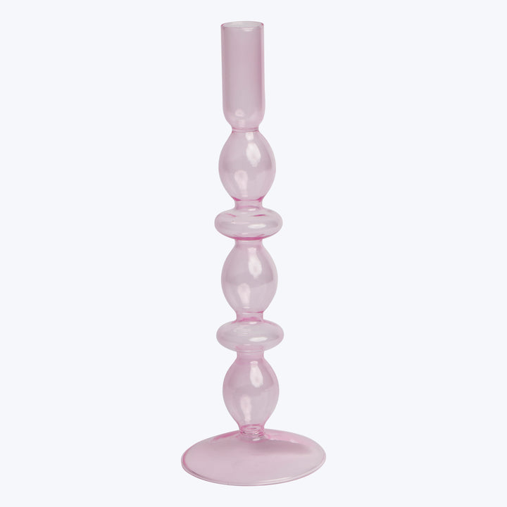 Translucent pink glass candlestick holder with bulb-like shapes, white background.