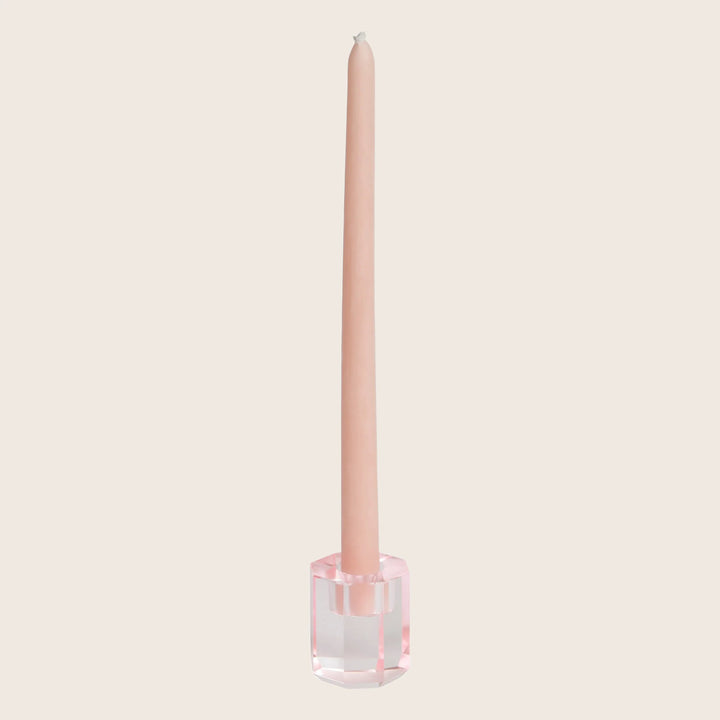 New light pink candle in geometric glass holder, unlit wick.