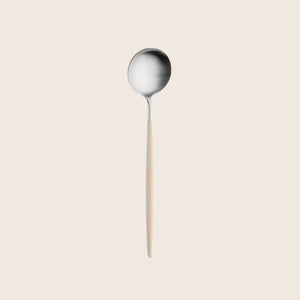 Modern gold and green spoon with sleek designer aesthetic. - hover
