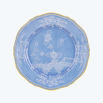 Ornate decorative plate with detailed design, gold trim and pastoral scenes