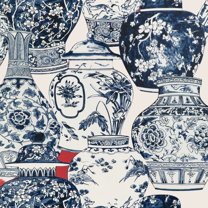 Assortment of Chinese blue and white porcelain vases on display.