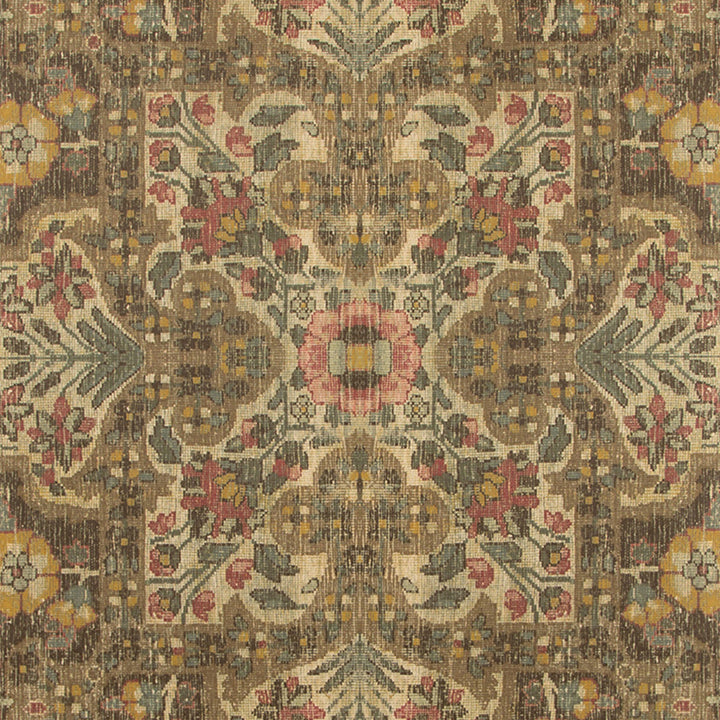 Intricate symmetrical floral carpet design in warm vintage hues.