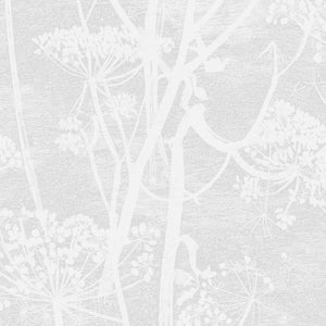 Monochrome botanical design with radial symmetry on textured background surface.