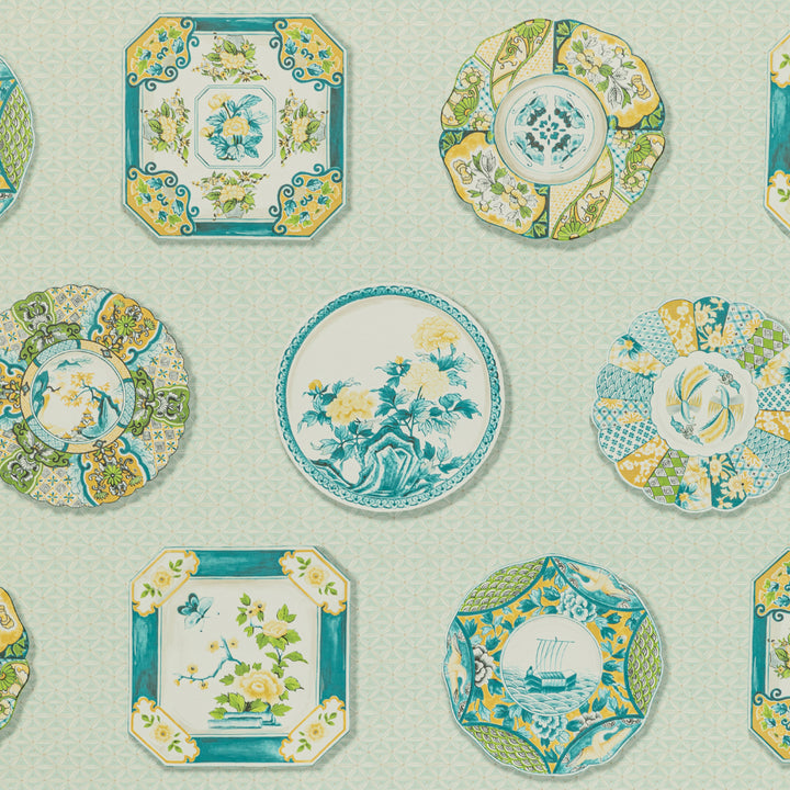 Collection of vintage decorative plates with floral and geometric designs.
